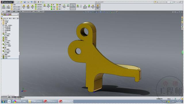 用SolidWorks画的金属连接件，此图蓝色面的切除，是个小难点